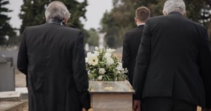 Pallbearers carrying a coffin