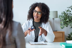 Doctor explaining something to a patient