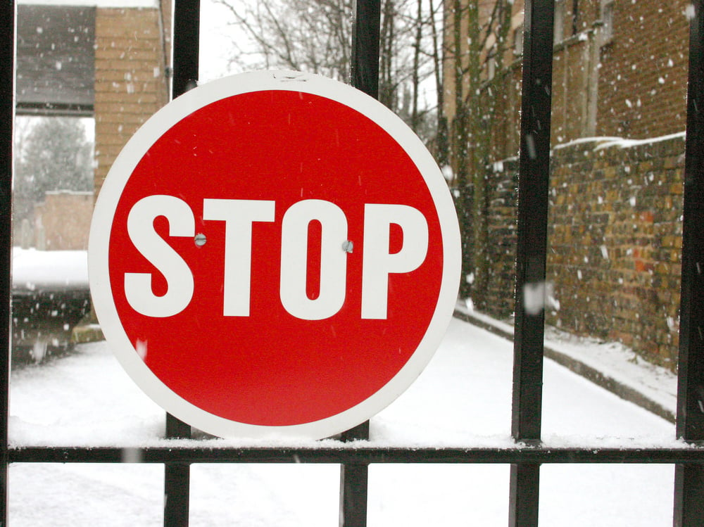 Stop sign on a fence